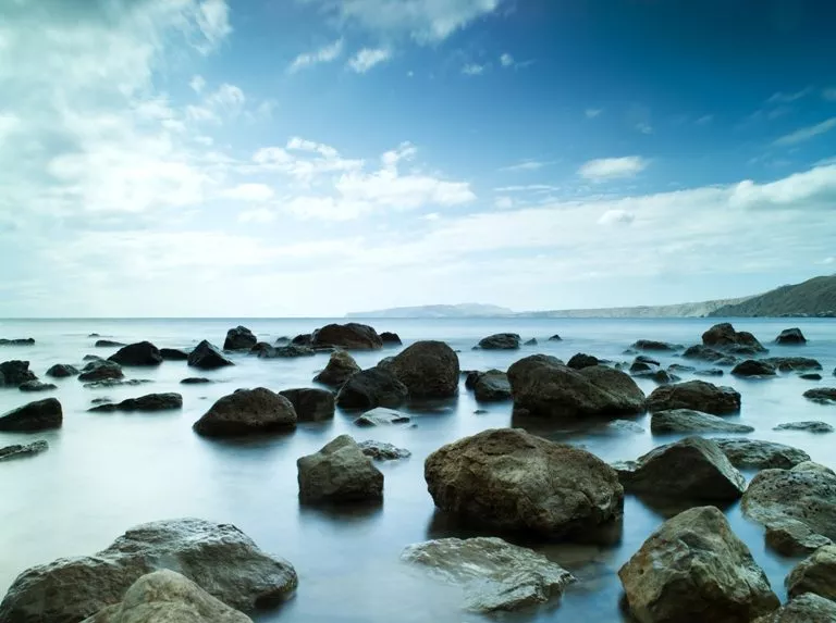 Sleeping sea under the blue sky © Depositphotos