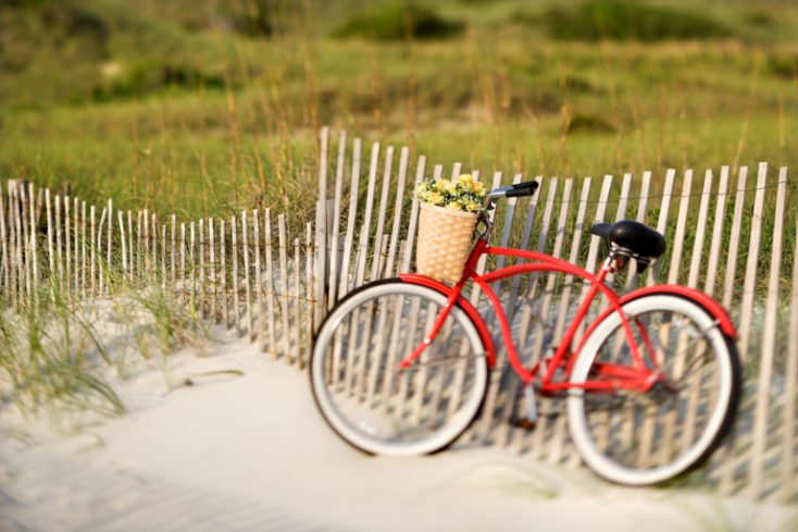 Bicycle at beach. © Depositphotos