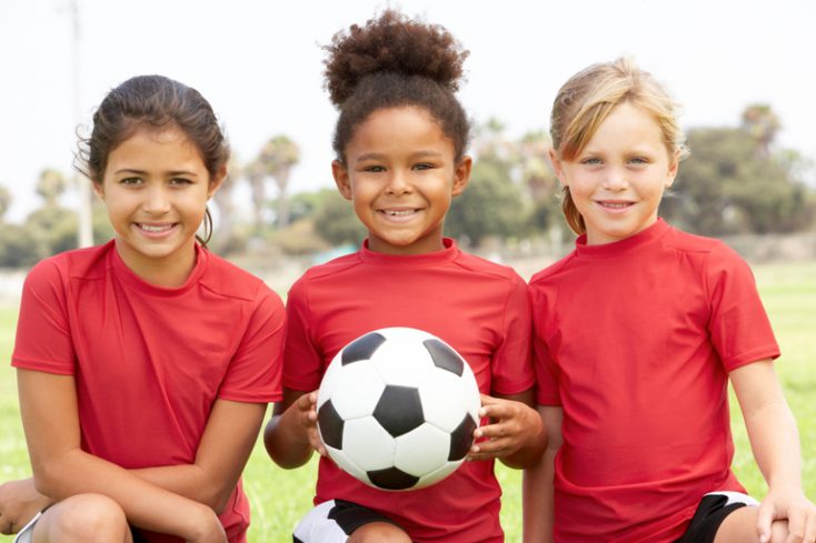 Young Girl In Football Team © Depositphotos