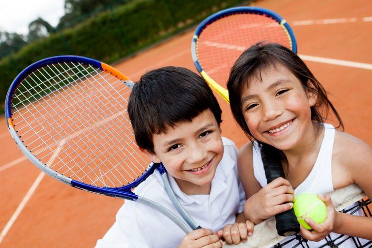 Young tennis players © Depositphotos