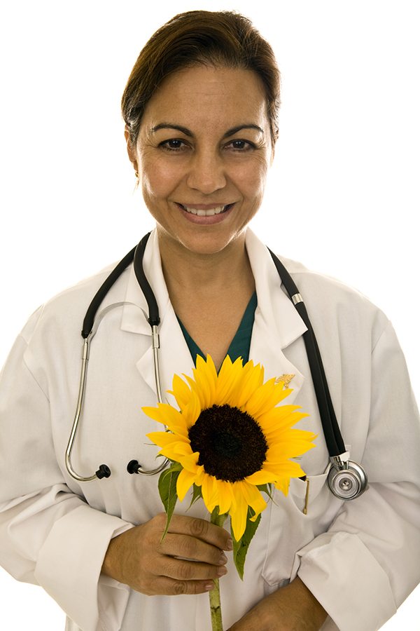 Female Doctor Holding a Sunflower