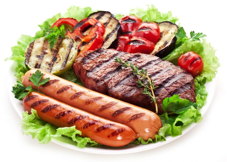 Grilled steak,sausages and vegetables.