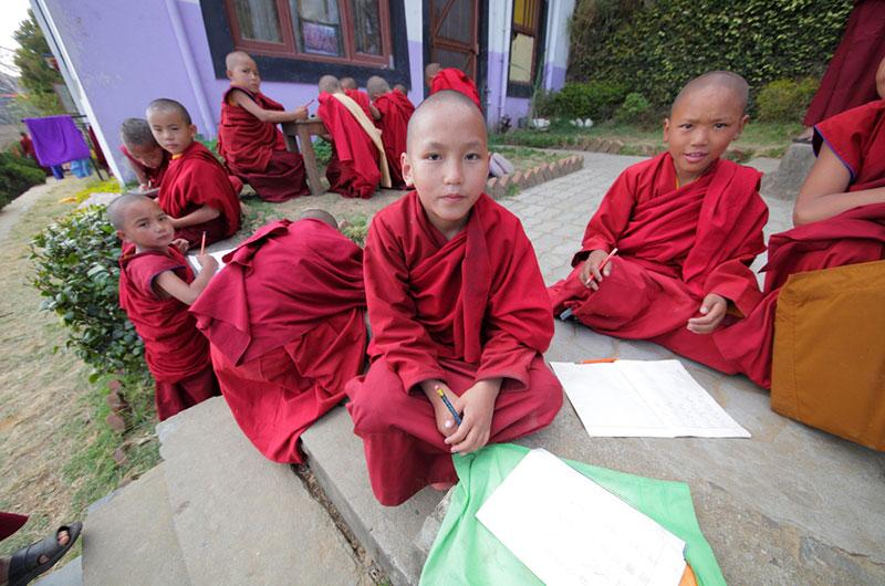 Yury Birukov photography monk children studying