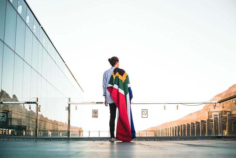 Justin Govender photography man with a flag