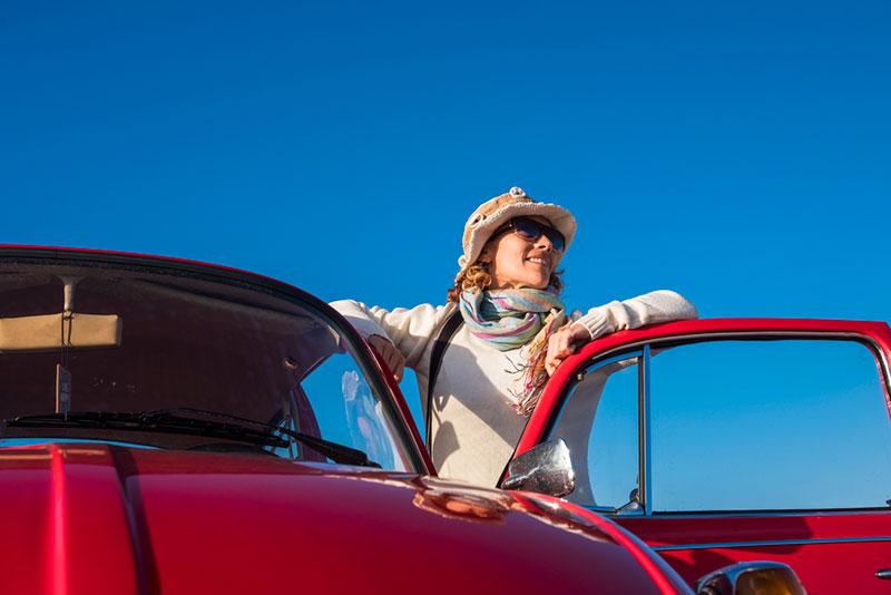 Simona Pilolla photography - woman in a red car