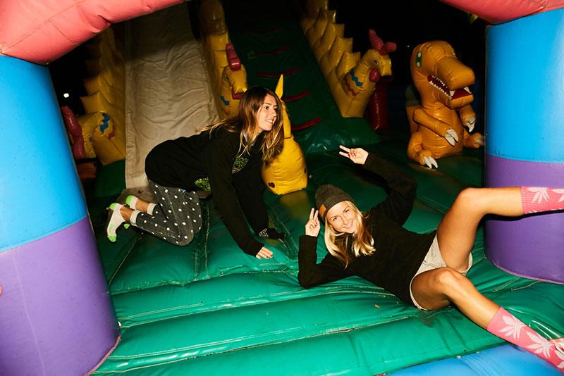 Evgeny Lobanov photography - teenagers in an inflatable castle