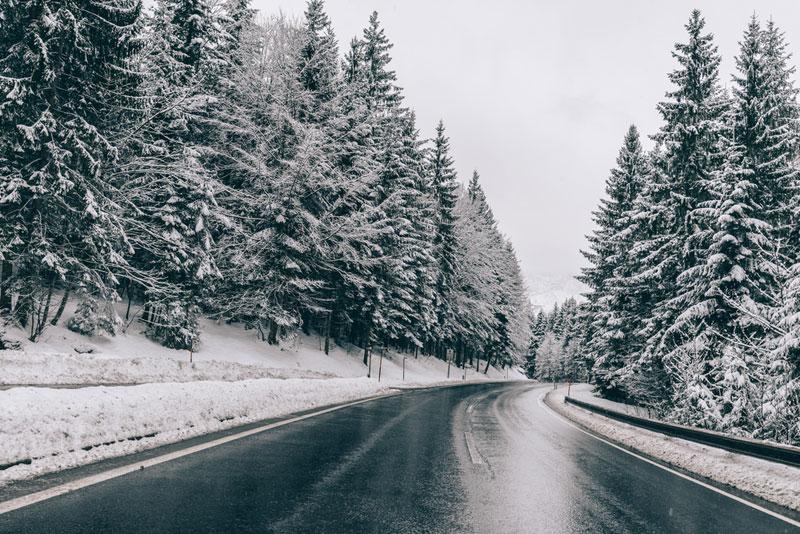 László Lőrik photography - a winding road in the winter time