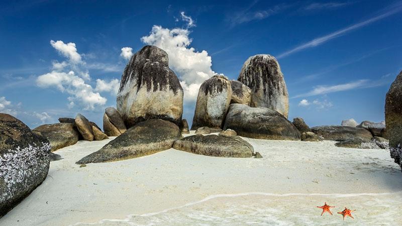 Granite rocks and starfish on the beach, Belitung island, Indonesia