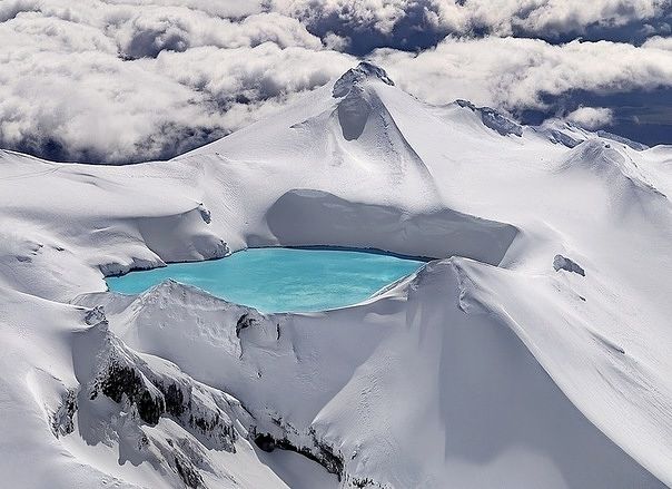 Emerald Lake is located in Tongariro National Park in New Zealand. It’s located in the crater of an extinct volcano!