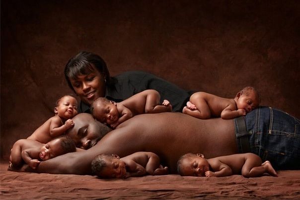 What an adorable family picture! Not too many families could get a photo like this!