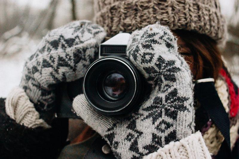 Stylish gorgeous girl with photocamera