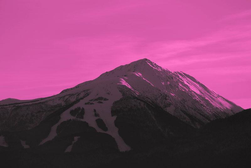 trendy images - mountain peak with surreal sky