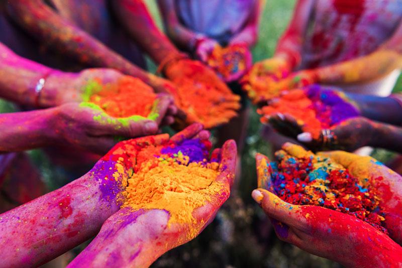 colorful powder in hands during holi festival