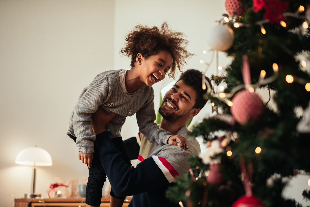  father and daughter celebrating Christmas 