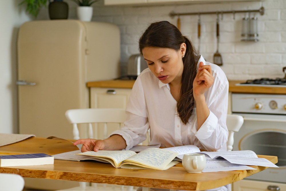 Young woman studying at home