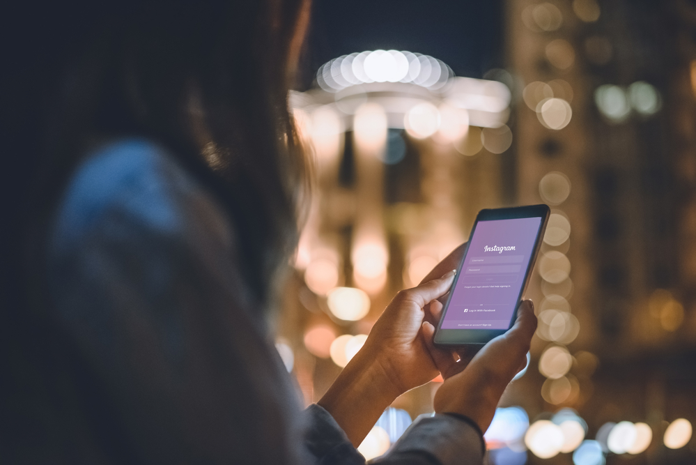 girl holding smartphone