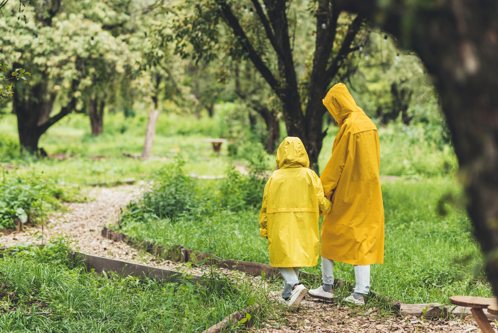 child and mother walking