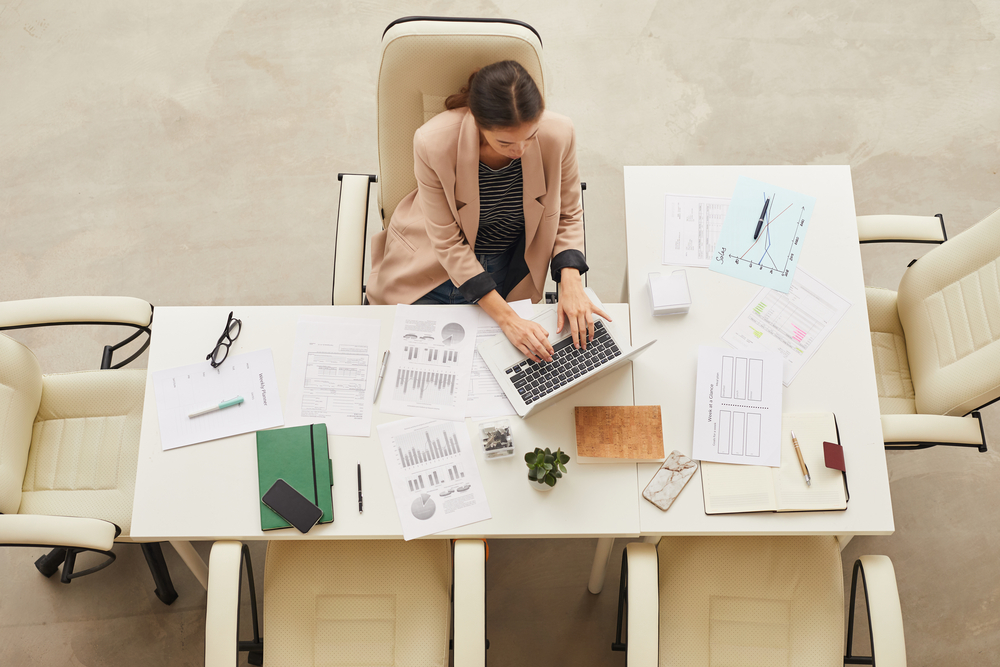 stock image of businesswoman working on laptop