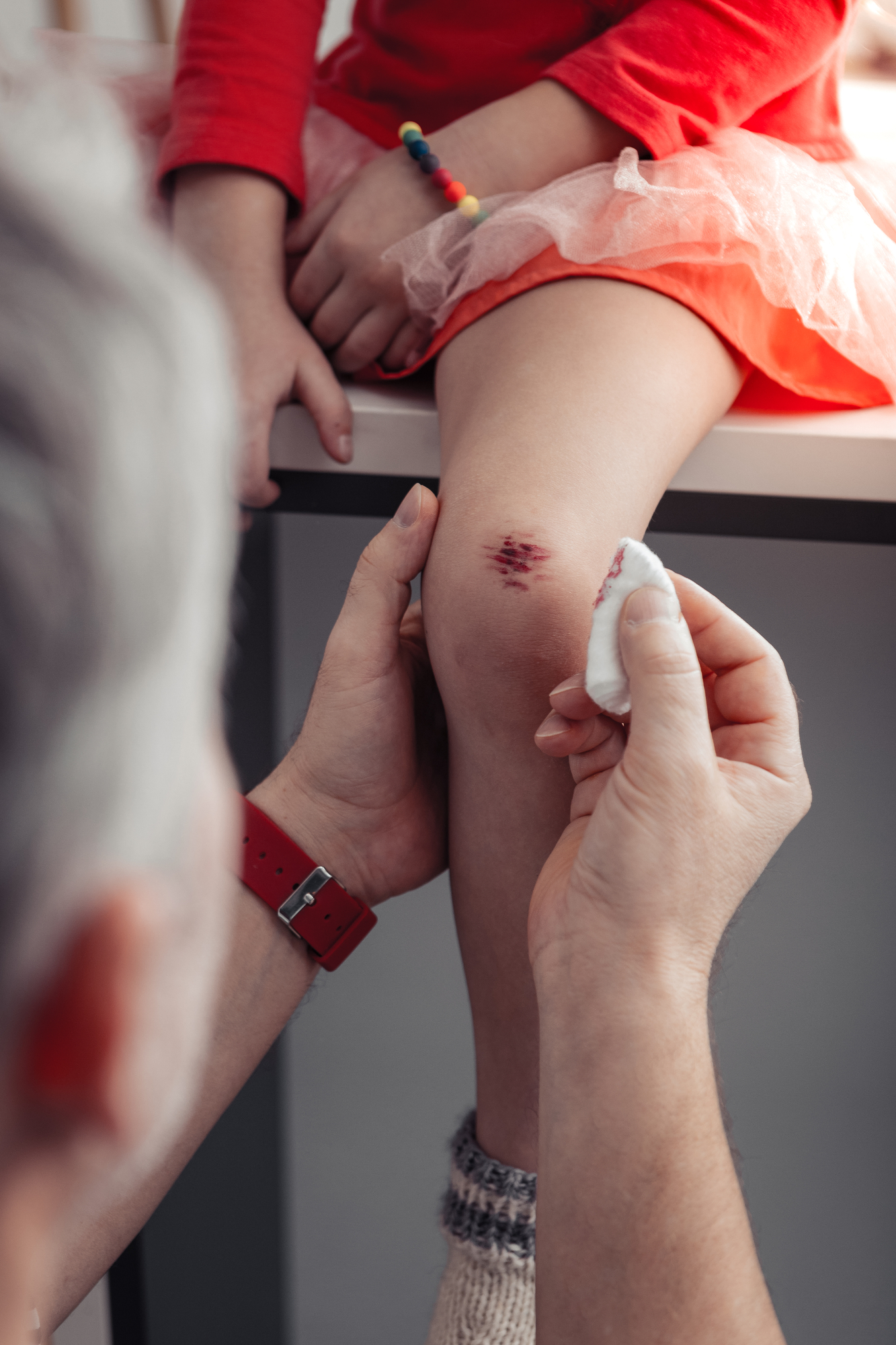 father helping child stock image