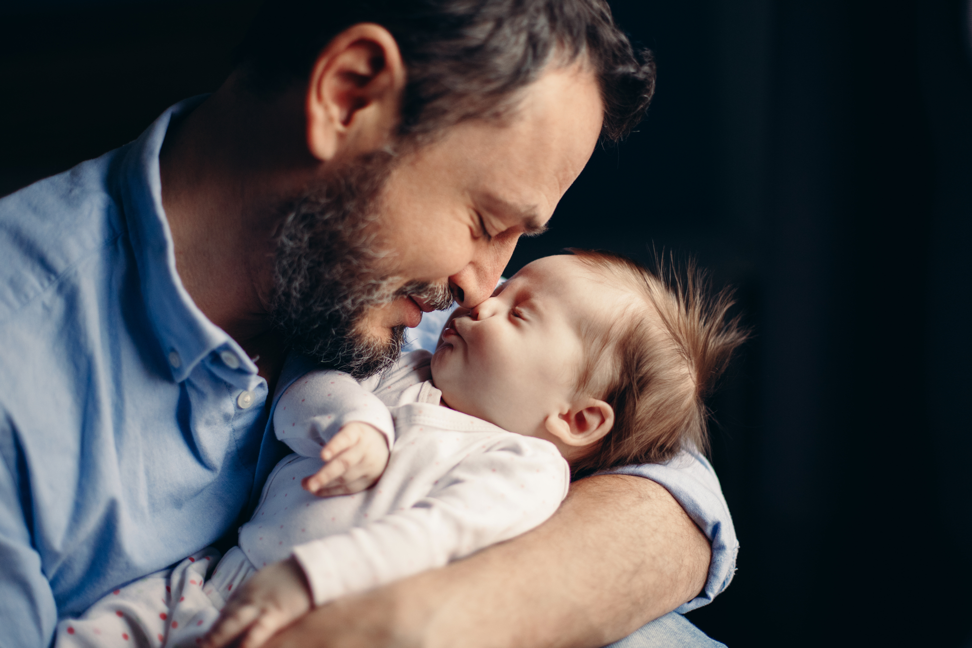 Closeup portrait of father and baby