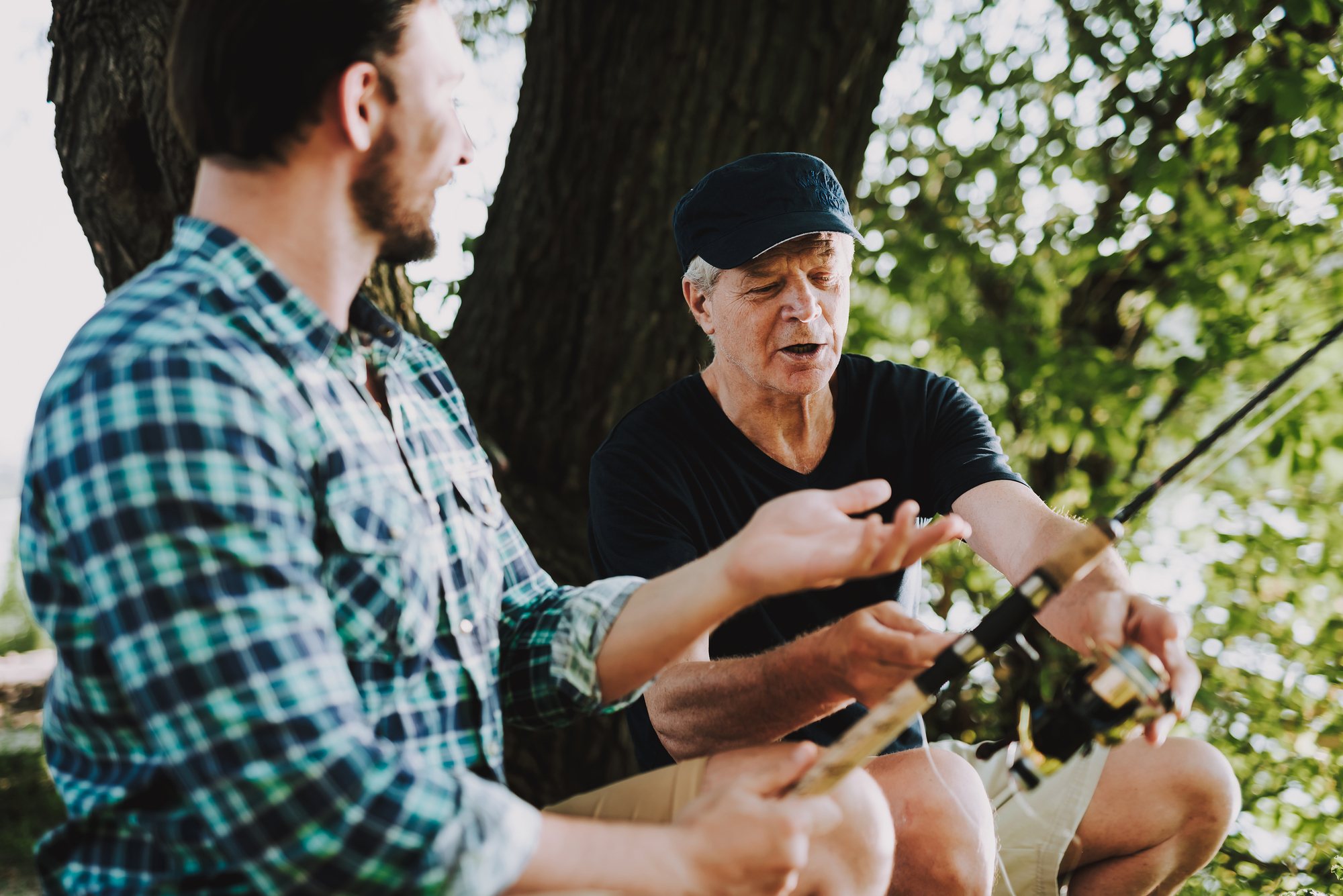 father and son fishing stock photo