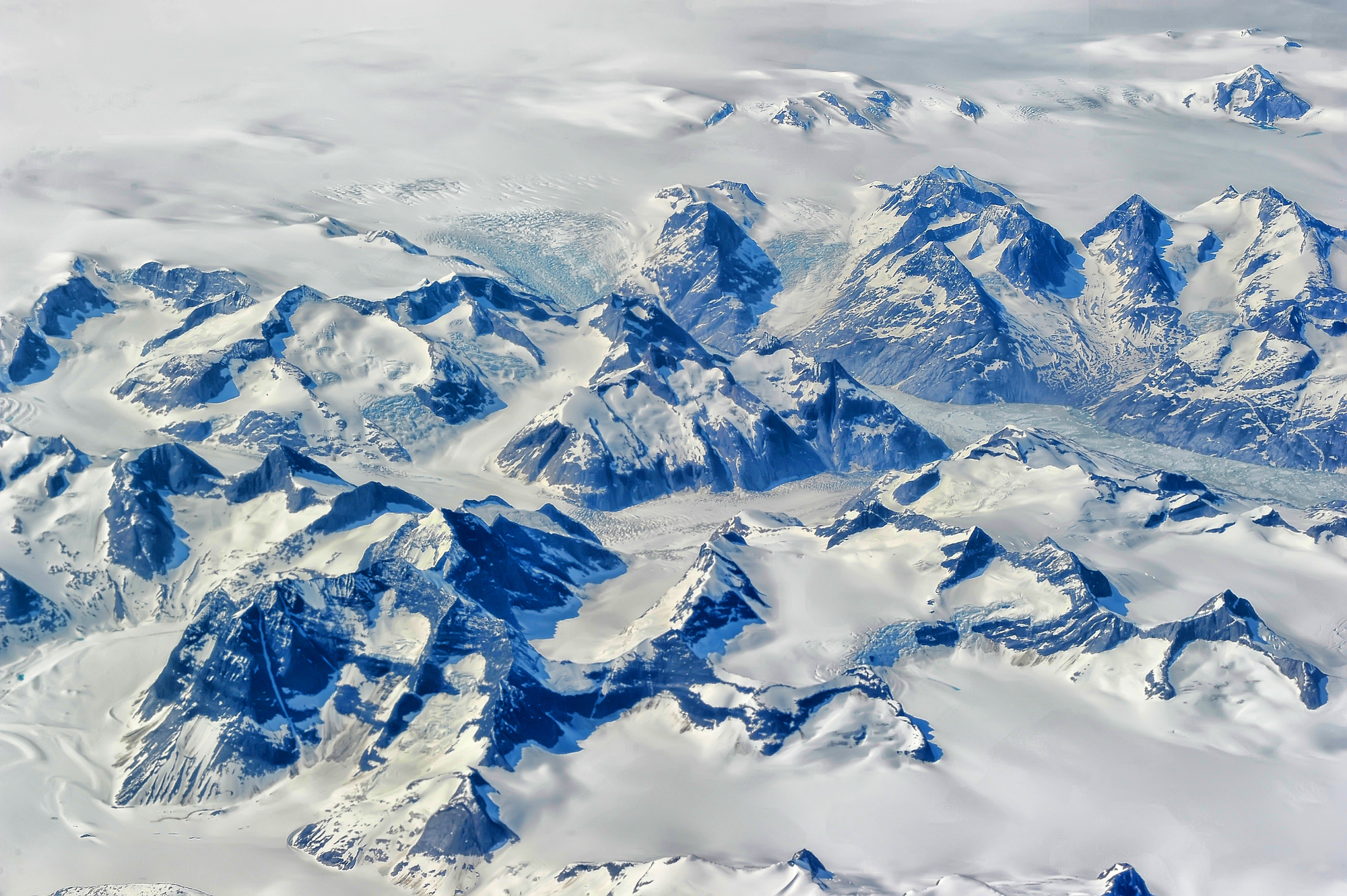 aerial shot of snowy mountains 