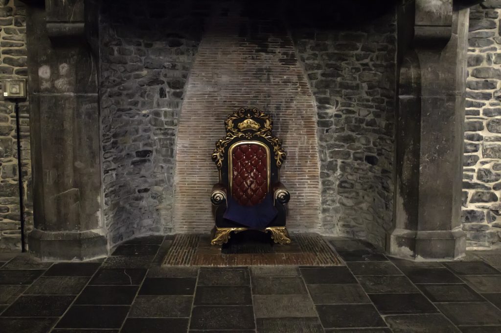 Throne in medieval castle stock photo