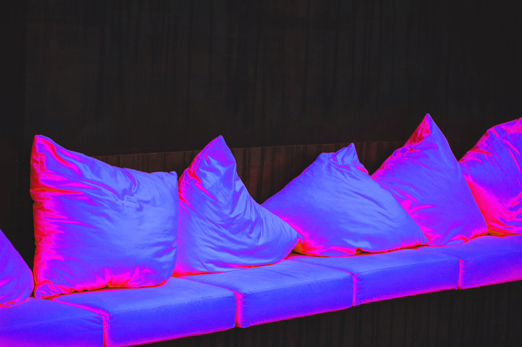 Pillows in Ultra Violet light stock photo