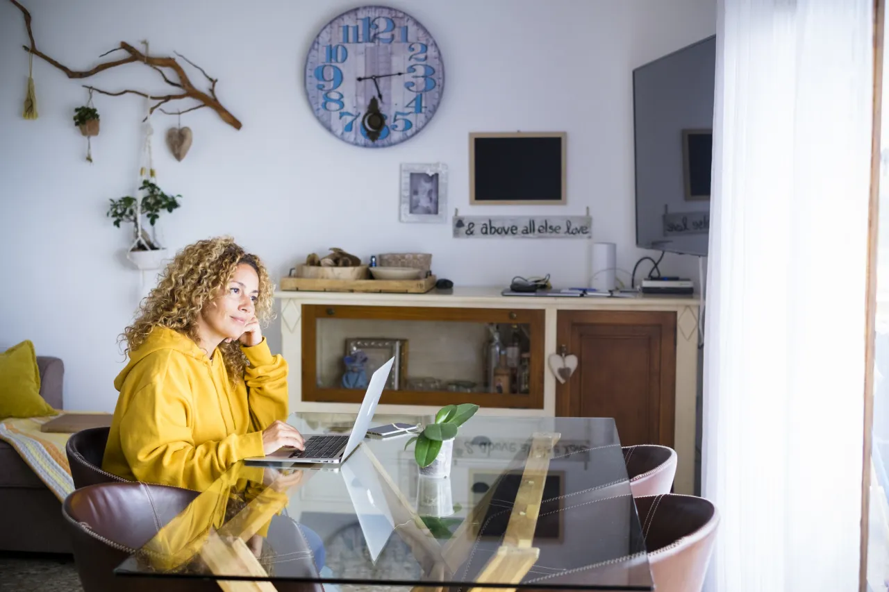 Beautiful young adult woman at home stock photo