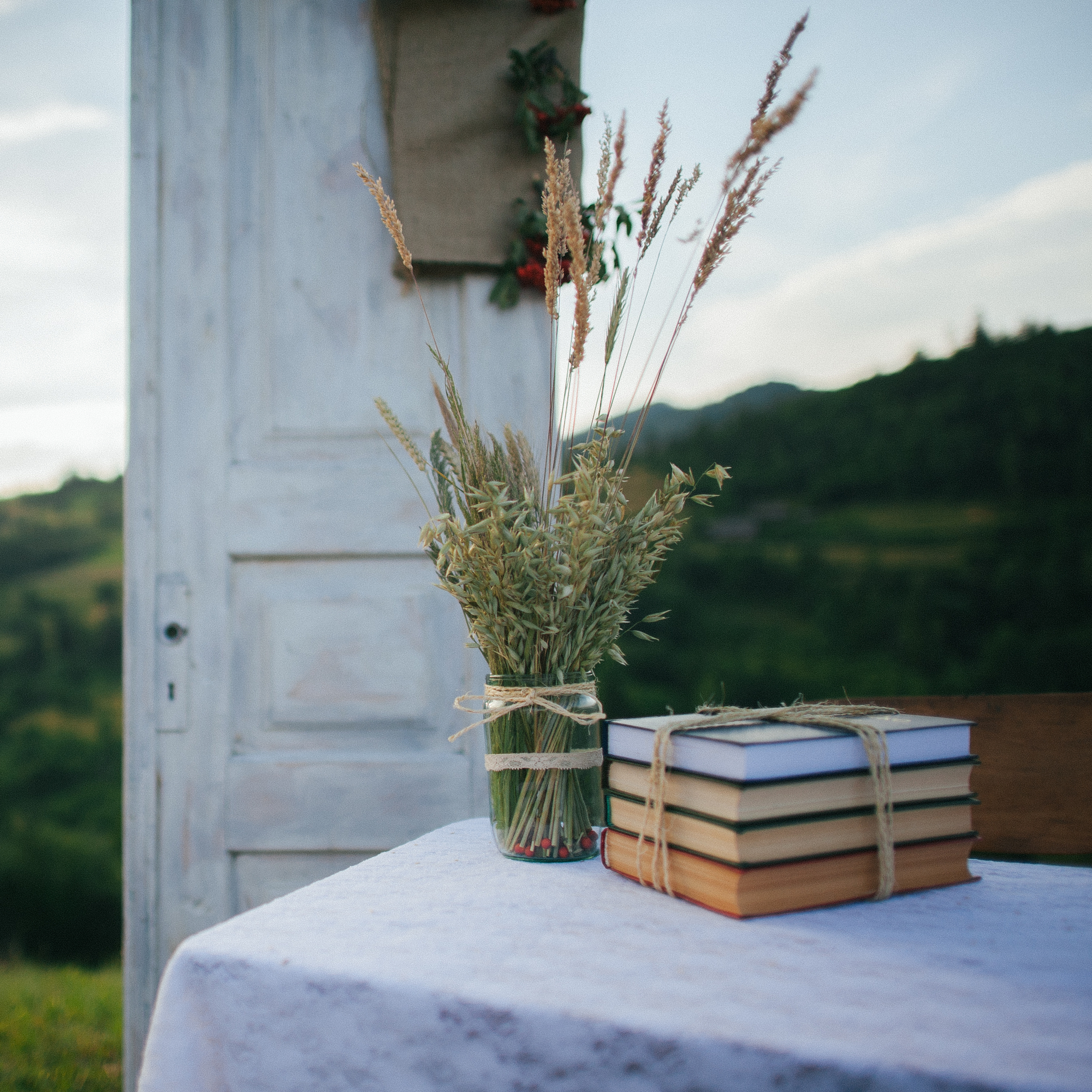 summer still life photo cover with books and flowers