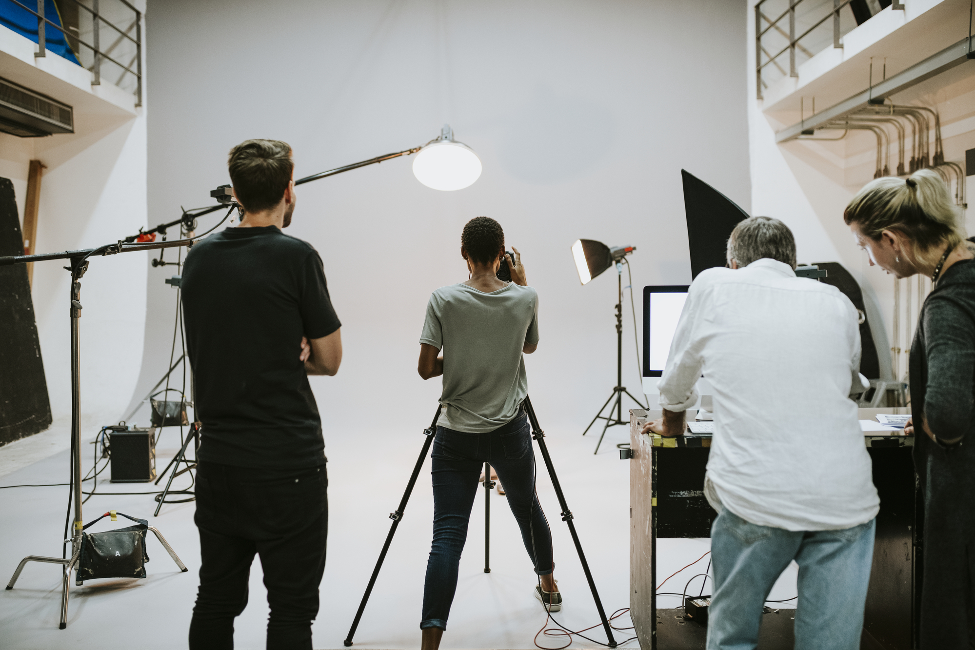 Crew working together in the studio stock photo