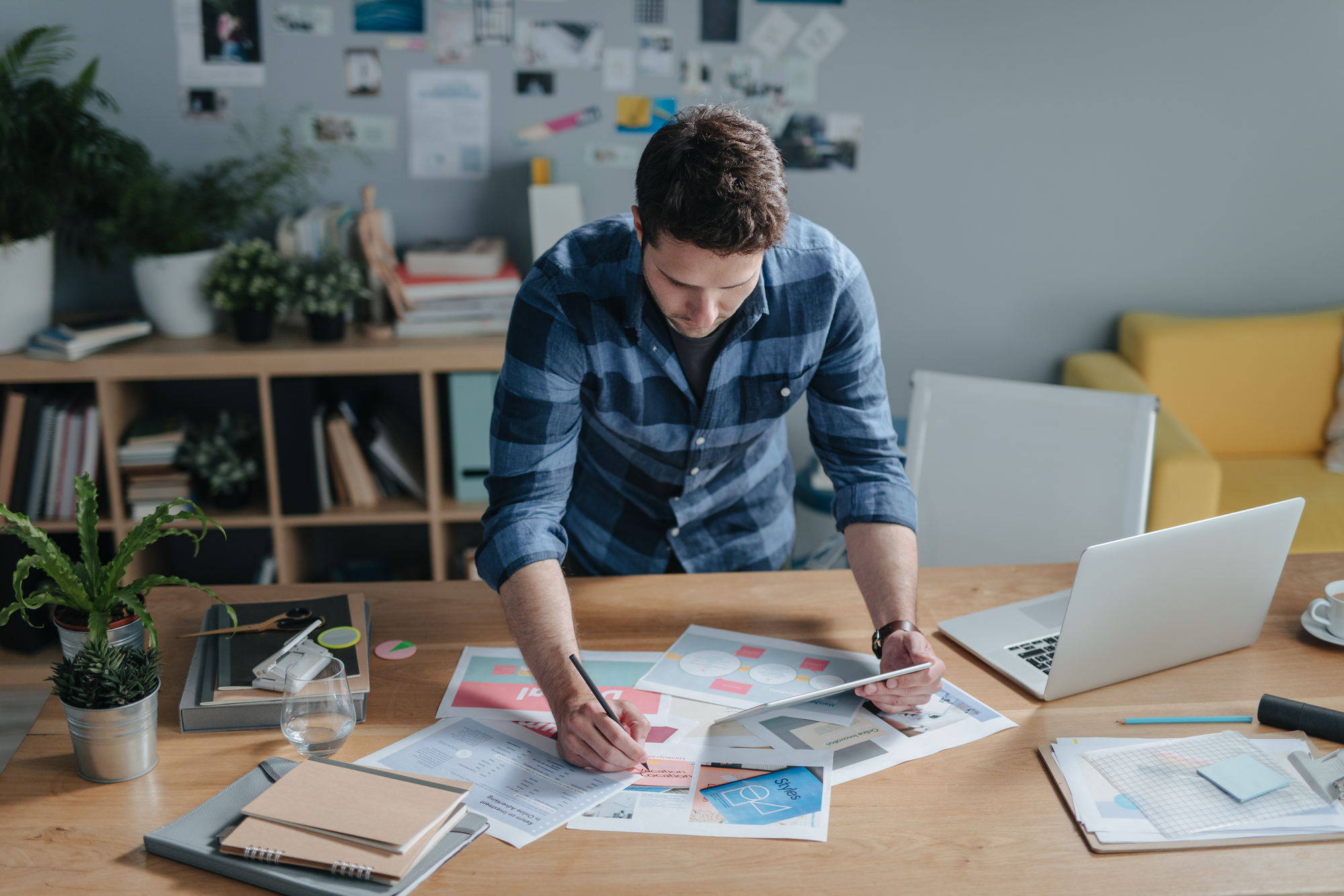 Handsome serious modern businessman working stock photo