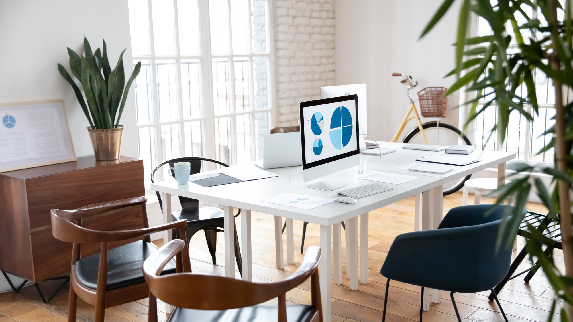 Empty loft workplace with wooden table stock photo