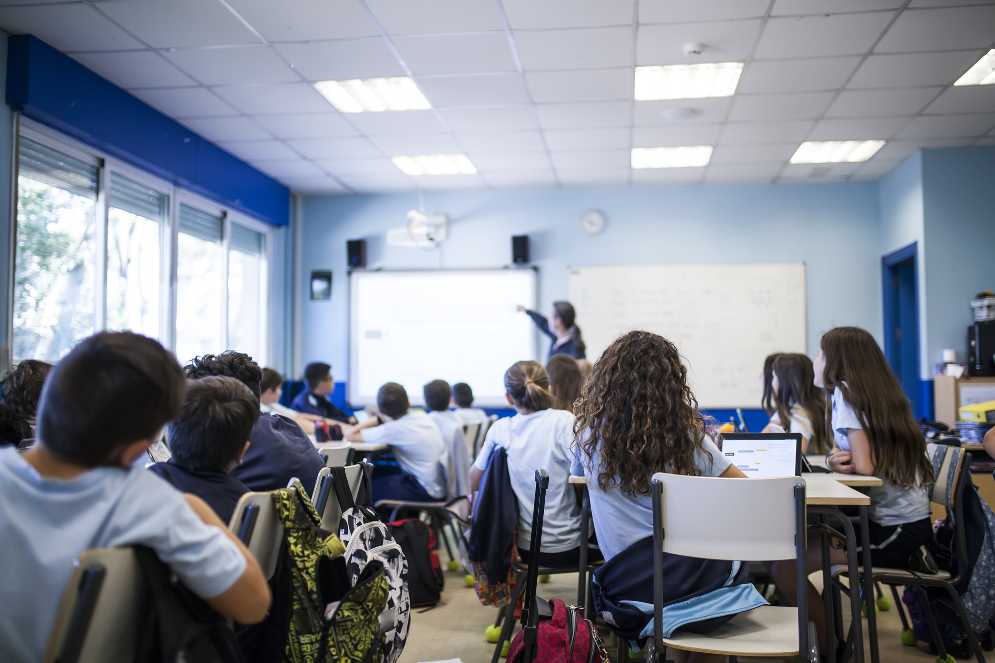 children in classroom stock image