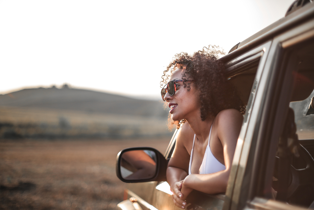 stock photo woman car road