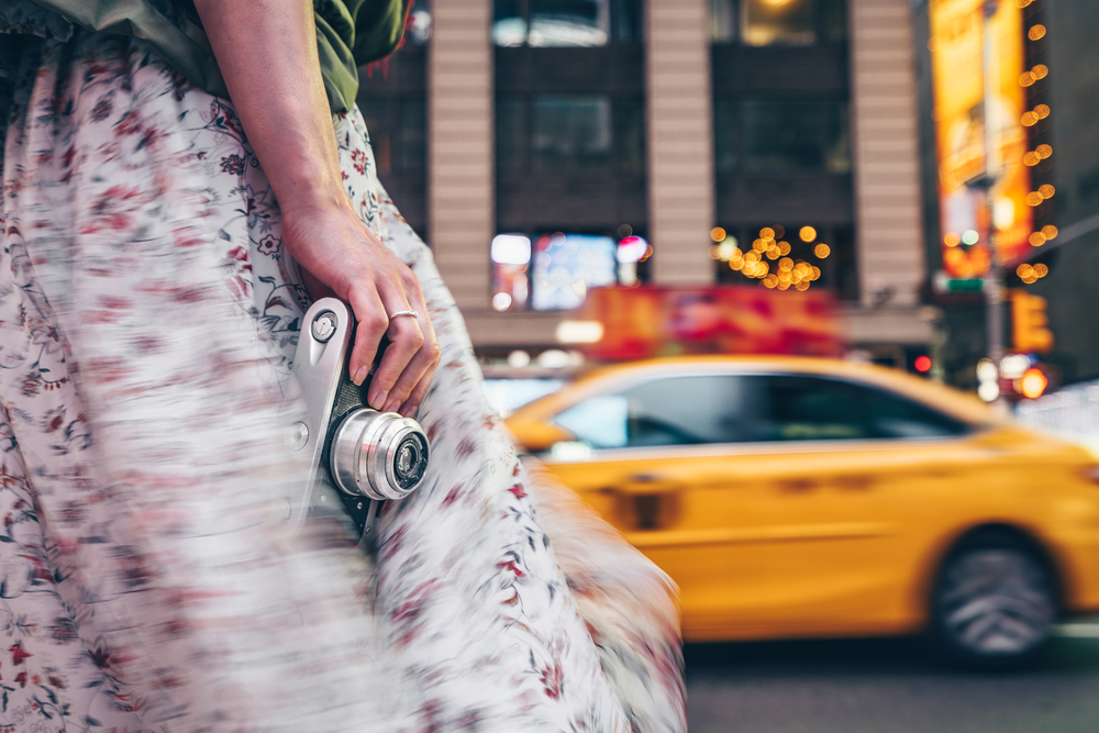 stock photo girl taxi retro camera