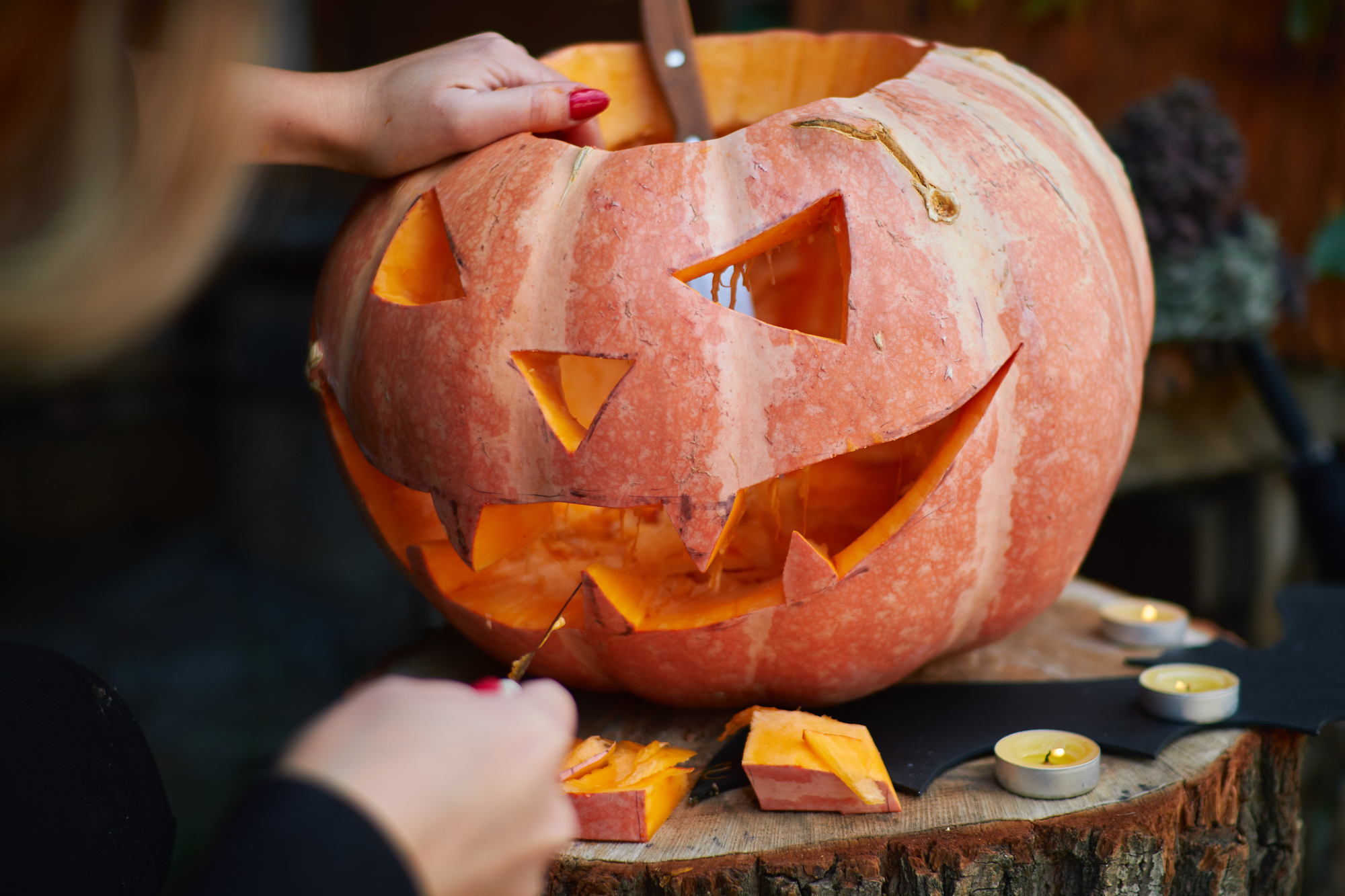 carving pumpkin stock photo