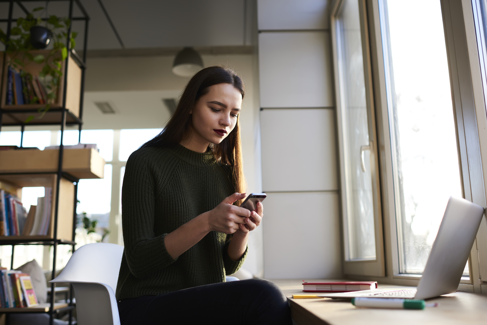 stock photo woman mobile phone typing