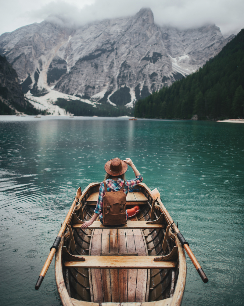 travel photography stock photo boat lake mountains