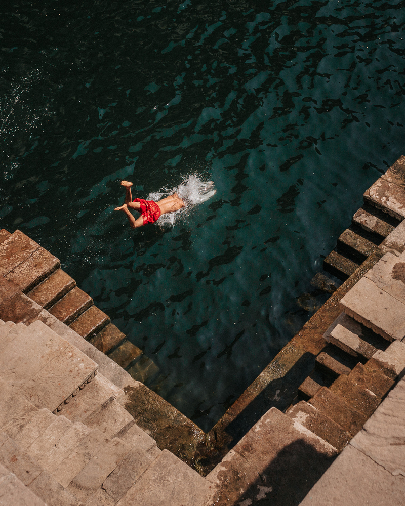 stock photo water man jump