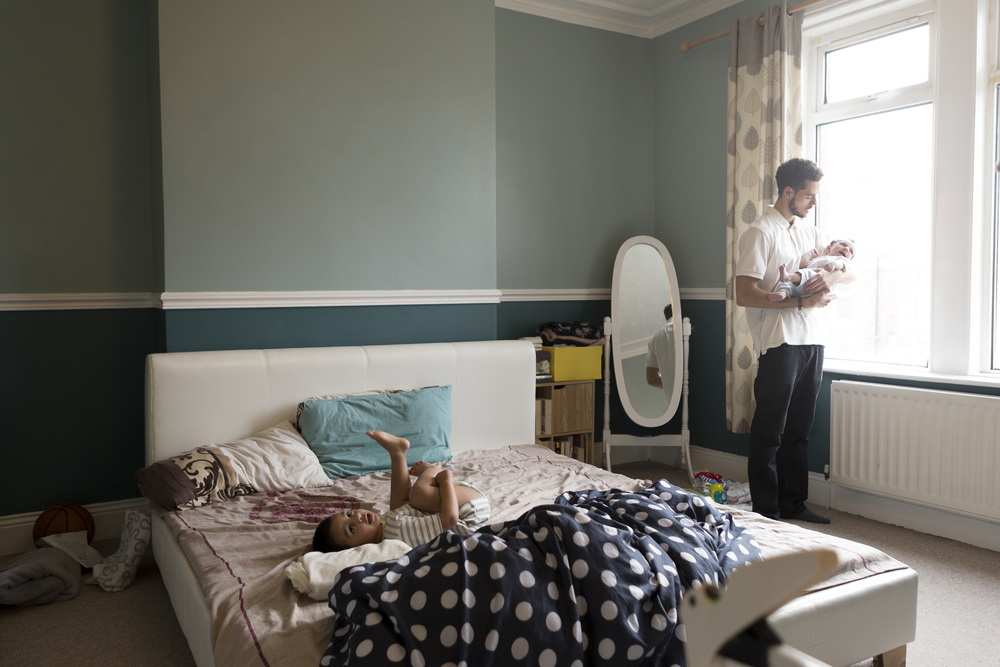 stock photo family father bedroom