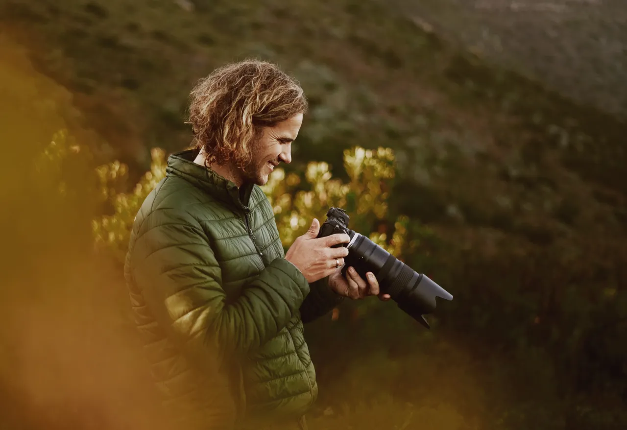 Male photographer in nature stock photo