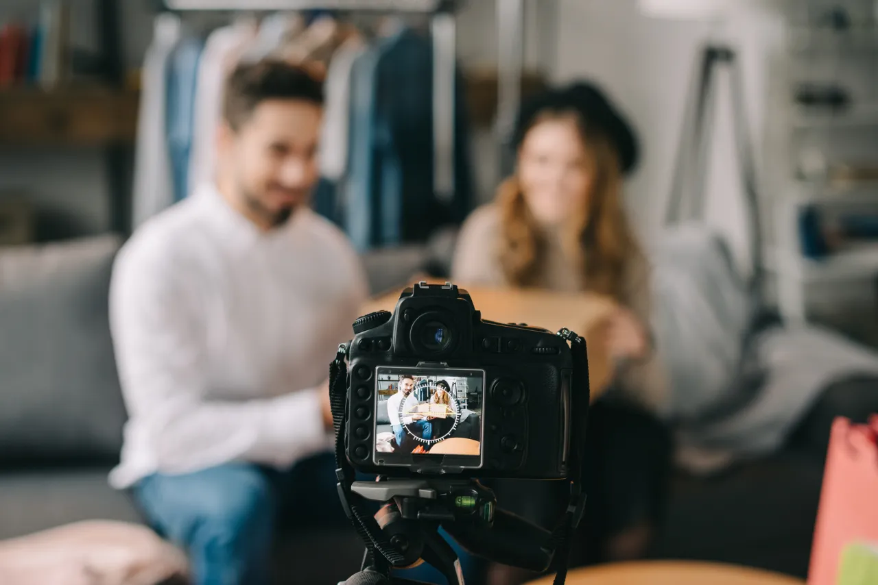 Caucasian couple filming stock photo