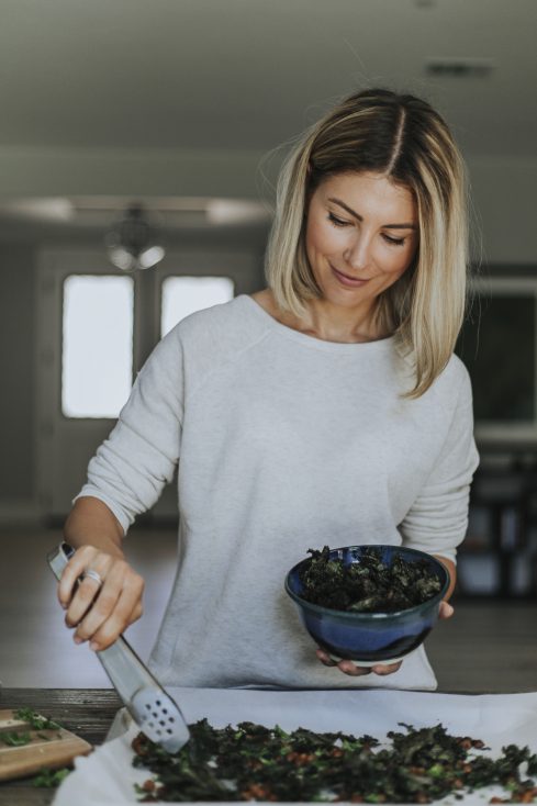 Woman serving kale