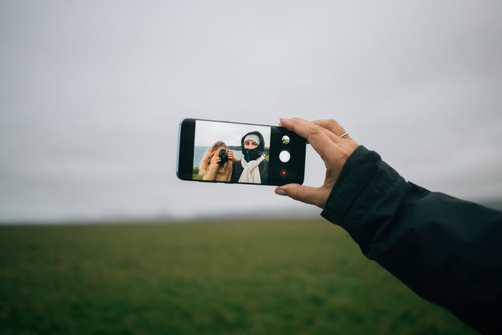 people taking selfie