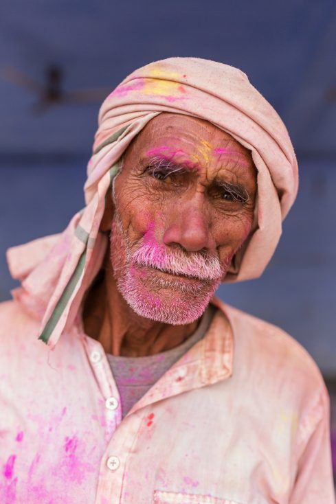 man celebrating Holi in India