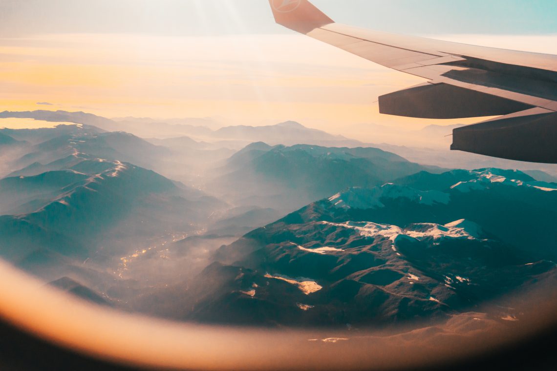 stock photo travel photography plane sky clouds