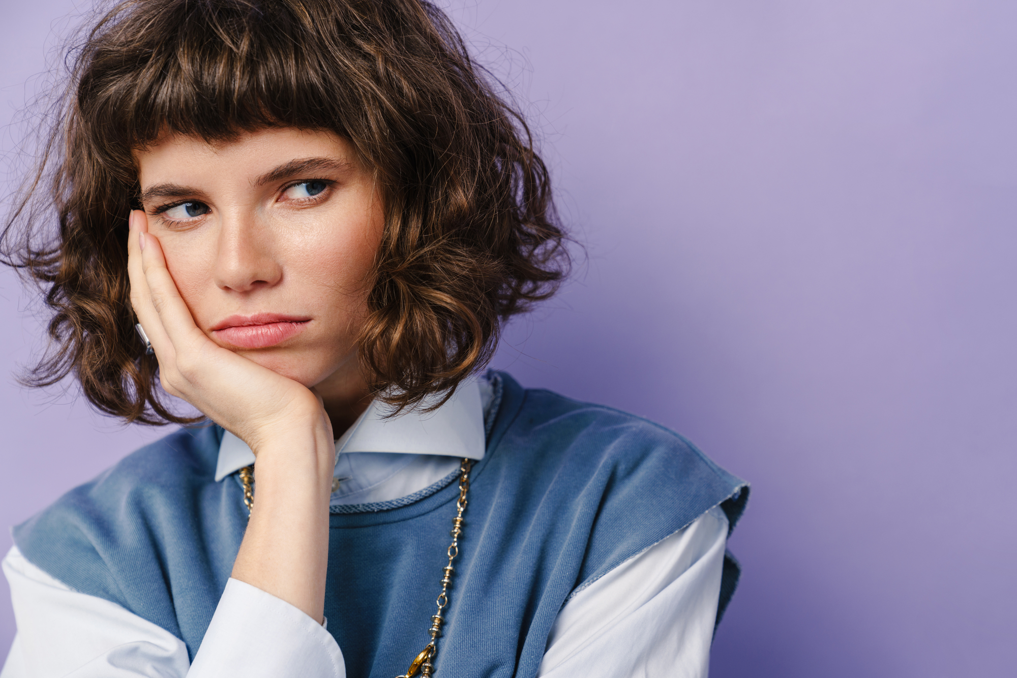 Serious beautiful girl thinking - stock photography portrait