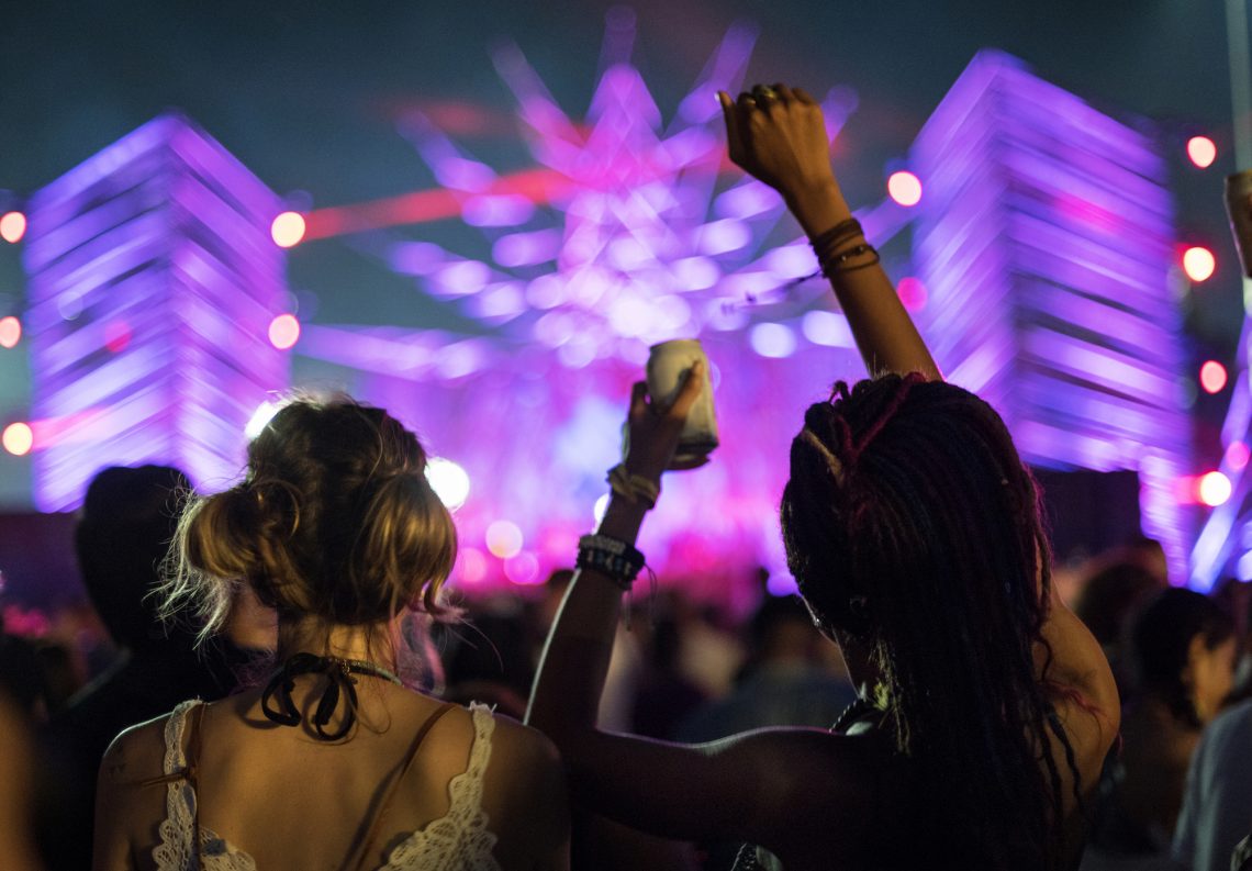 Diverse group of people enjoying a road trip and festival