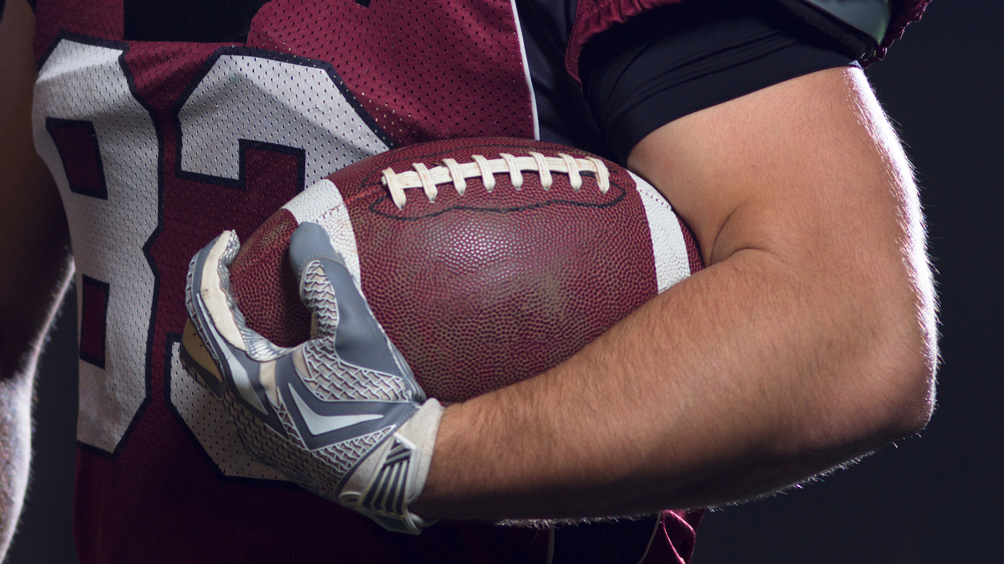 portrait of confident American football players